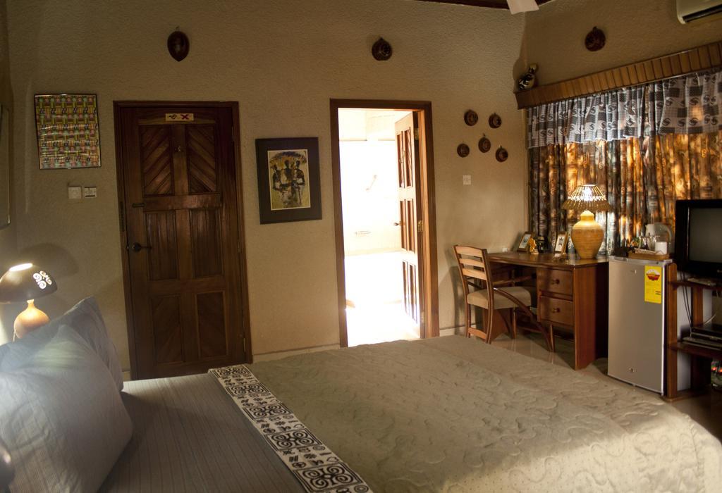 Four Villages Inn Kumasi Room photo